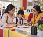 Parent and child completing a school admission enquiry